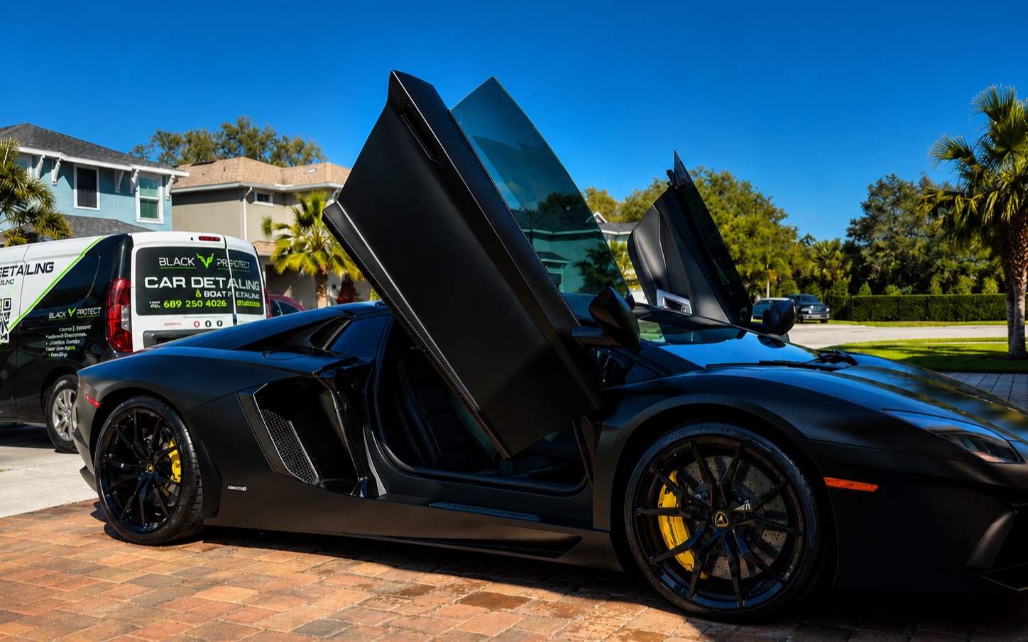 Mobile auto detailing in Orlando, FL · Lamborghini Aventador at customer driveway by Black V Protect