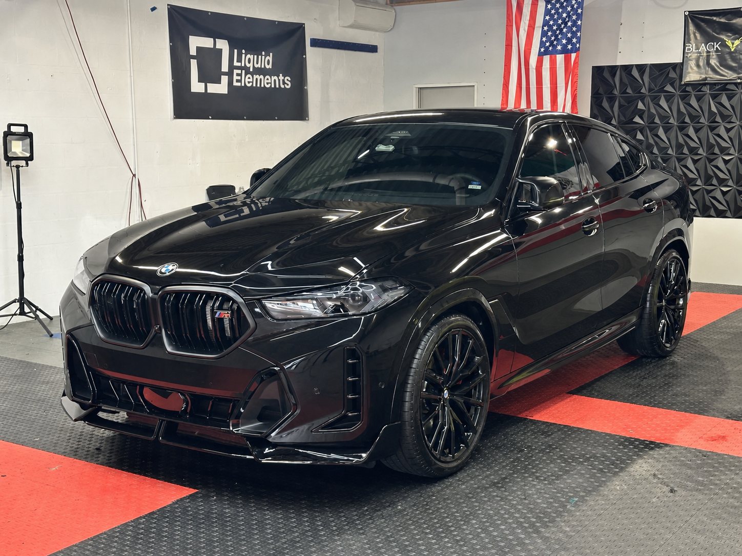 Vinyl wrap in Orlando, FL · BMW X6 after gloss black · full color change · homepage