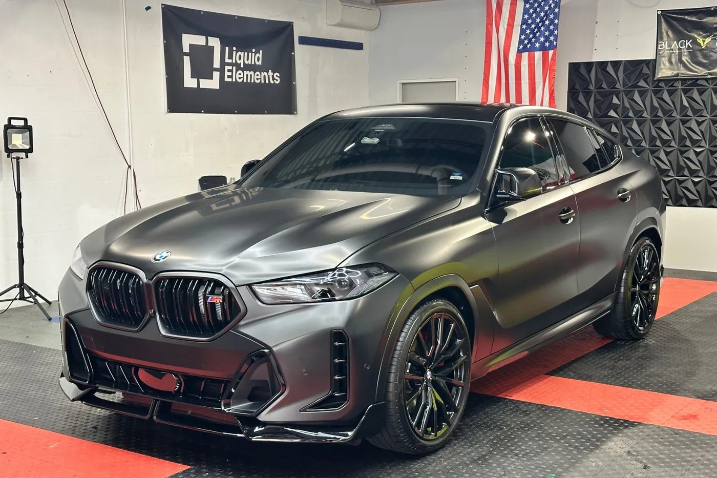 Vinyl wrap in Altamonte Springs, FL · BMW X6 before with factory matte black finish · city page